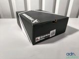 a black box that is sitting on a white table
