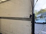 an image of a moving truck with the door open