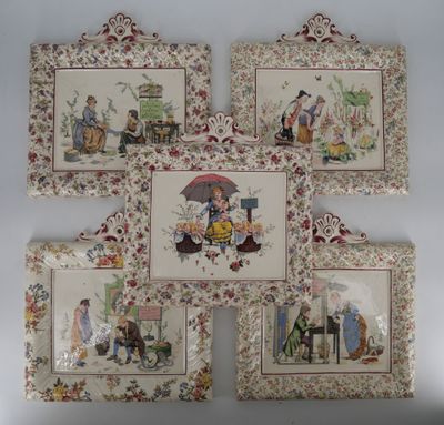 four framed pictures of people with umbrellas and flowers on them