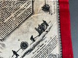 a red and white scarf with a map on it