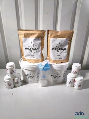 two buckets of whey yogurt next to a bucket of whey yogurt