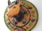 a picture of a horse head mounted on a wall