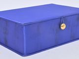 an image of a blue box sitting on top of a white table
