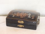 a black and gold box sitting on a table