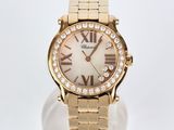 a close up of a gold watch with roman numerals on the face