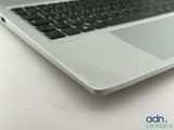 a close up picture of a laptop computer on a table