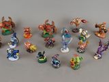 a lot of figurines that are sitting on a table