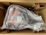 a box with some items inside of it on the floor
