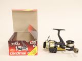 a box with a fishing reel next to a box with a fishing rod