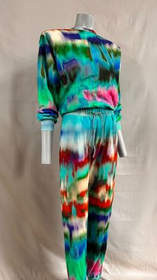 a mannequin wearing a colorful tie dye suit on a mannequin mannequin mannequin mannequin mannequin mannequin manne