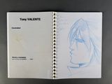 a drawing book with a picture of a man with long hair