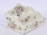 a picture of a small tray with a flower design on it