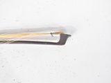 a small piece of hair that has been cut in half