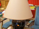 a lamp that is sitting on a table in a living room