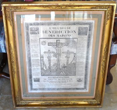 an old framed picture of a crucif cross with a man on the cross