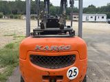 an orange forklift truck parked in a parking lot with a number 25 on the front of it