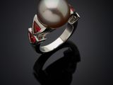 a pearl and diamond ring, by person