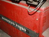a red box with a black and white logo on it