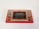 a close up of a nintendo game console on a white surface
