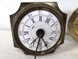 a clock that has roman numerals on the face of it