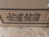 a box of screwdrivers sitting on the ground