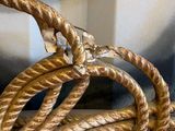 a gold rope that is on top of a table
