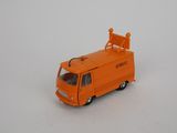 an orange toy truck that is sitting on a white surface