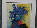 a picture of a painting of flowers in a vase on a table