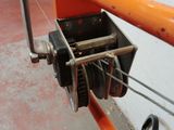 a machine that is sitting on the side of a building