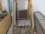 an image of a room with a ladder and a monitor