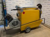 a yellow machine that is sitting in a room