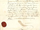 un vieux document portant un sceau de cire et un cachet de cire