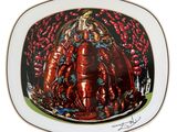 une photo d'une assiette sur laquelle est posé un homard