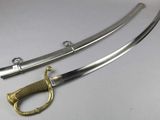 an image of a pair of swords sitting on top of a table