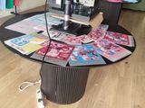 an image of a sewing room with a table and a sewing machine