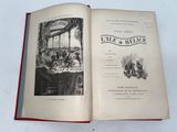 an open book with a picture of a group of people sitting at a table