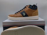 a close up of a pair of shoes on top of a box