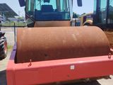 an image of a large roller roller in a parking lot