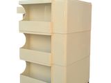 an image of a white cart with drawers on wheels