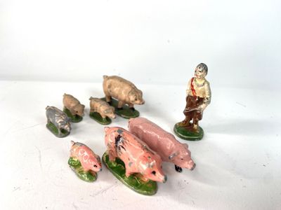 de nombreuses figurines d'animaux posées sur un fond blanc