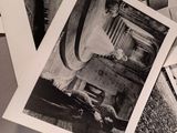 several black and white photographs of a man and a woman on a table