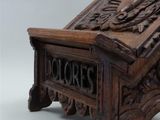 a wooden box that has a sign on it