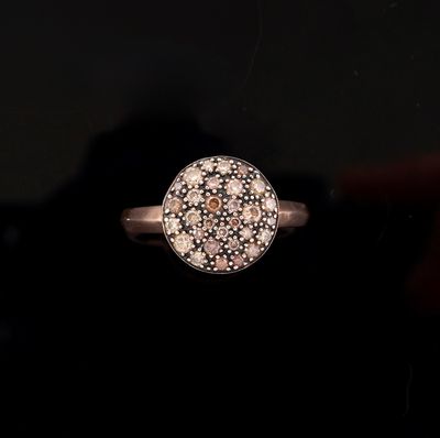 an image of a ring with diamonds on it
