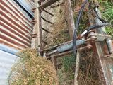 a ladder that is leaning against the side of a building