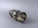 pair of silver salt and pepper shakers on a gray background