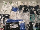 a lot of men ' s shirts that are wrapped in plastic