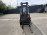 a forklift that is parked in a parking lot