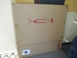 a cardboard box that is sitting on the floor