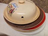 several plates stacked on top of each other on a counter