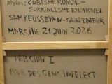 a chalk board with writing on it in a room